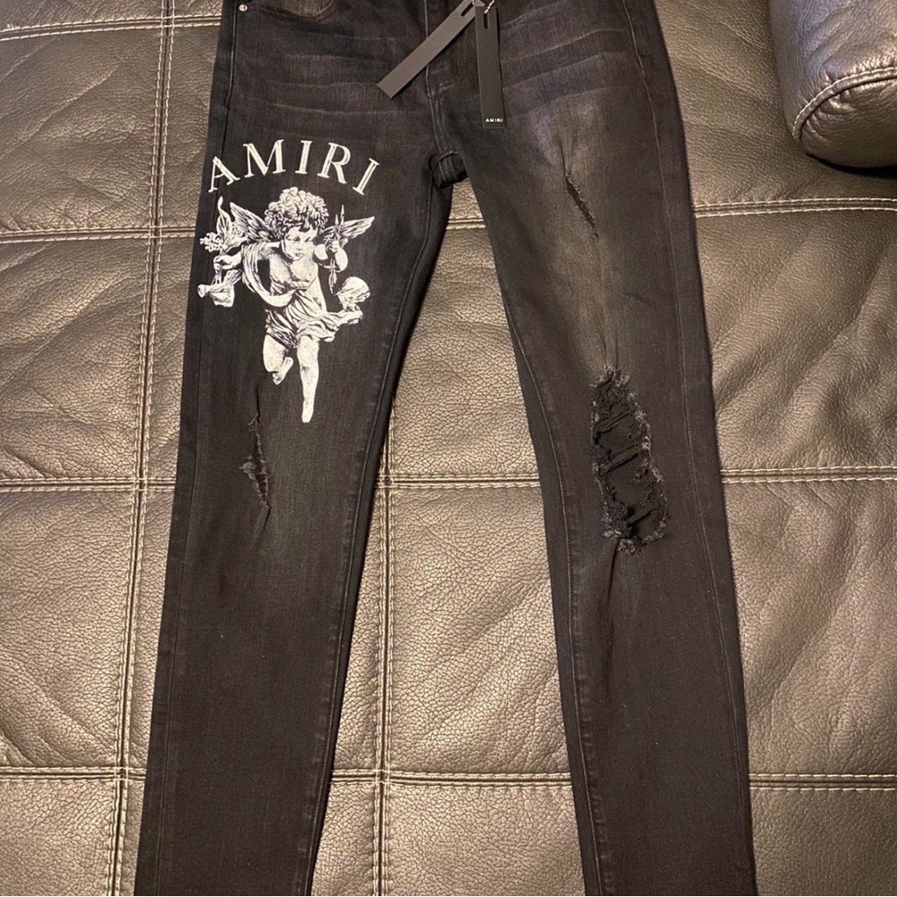 AMIRI Black Skinny Jeans with Distressed Details